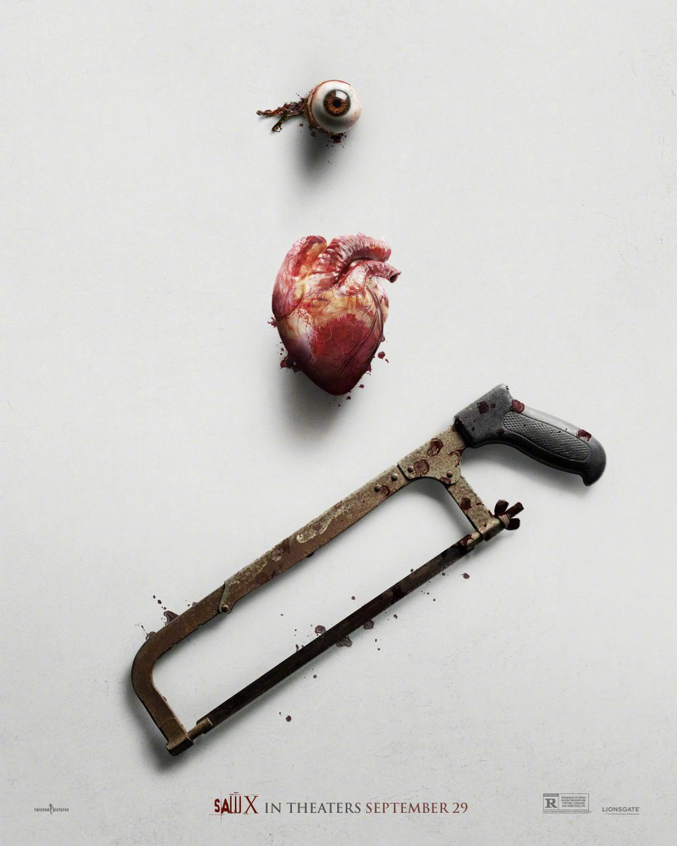 《电锯惊魂10》海报惊悚展现，以眼球、心脏和血浆为主题，简约却令人胆寒